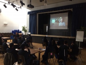Students watch case studies of social businesses